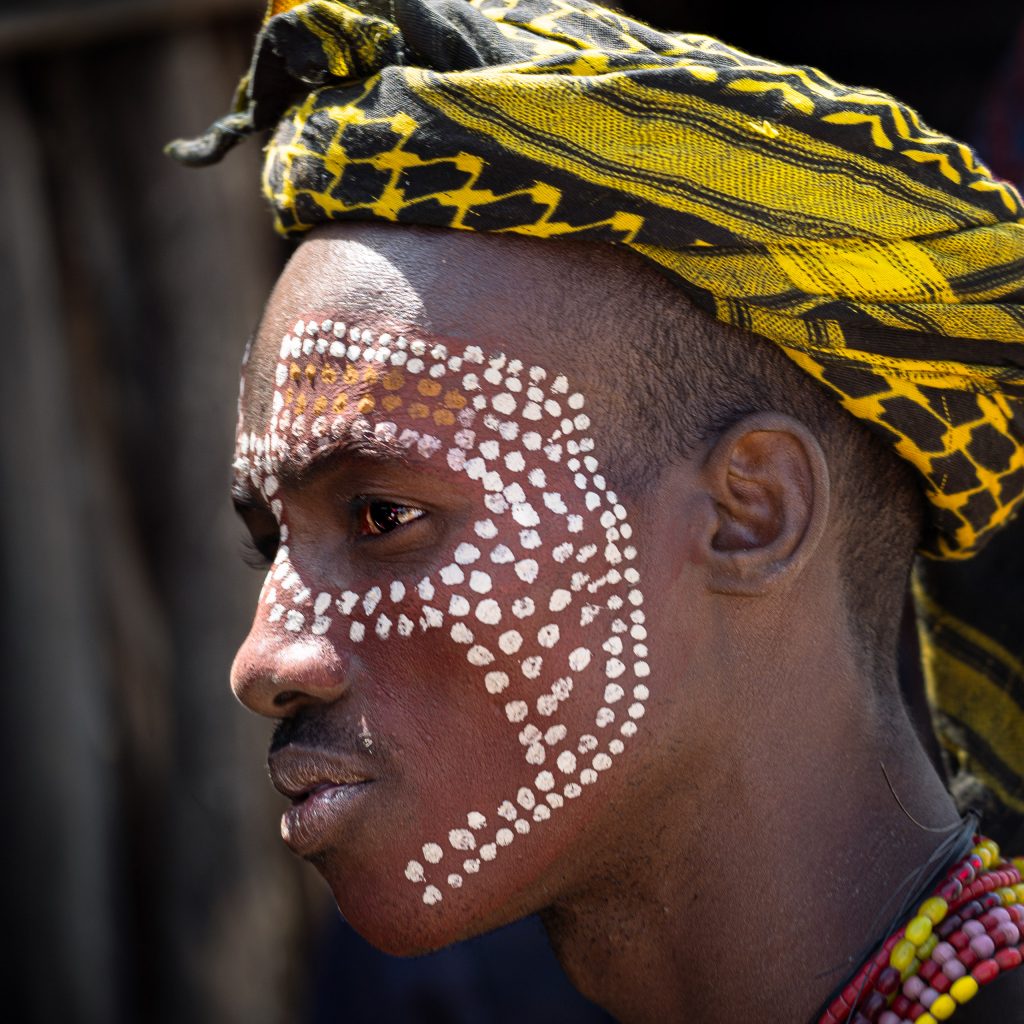 arbore with tribal paint in the face