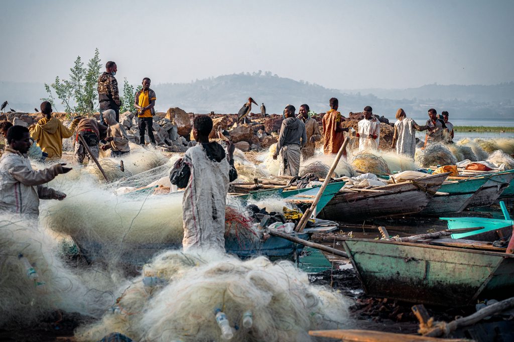 fishermen working with their nets