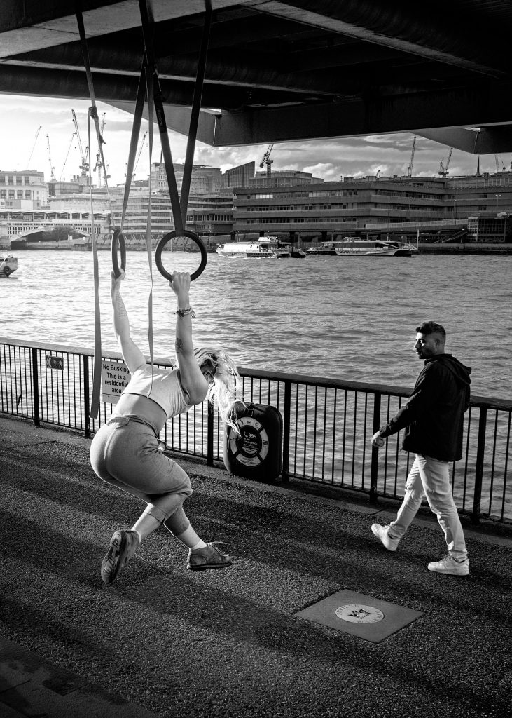 gymnast under the millenium bridge