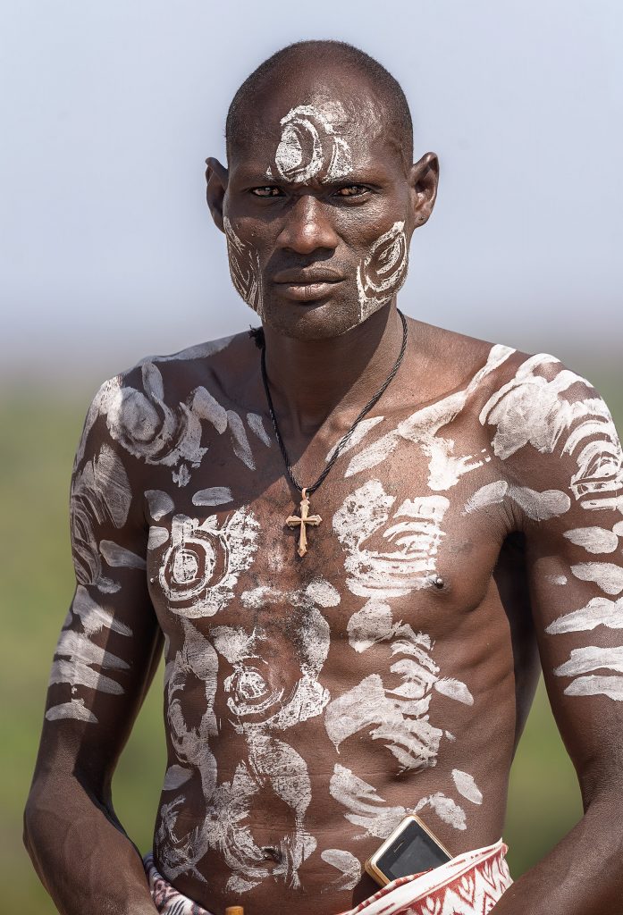 man from the karo tribe with body painting