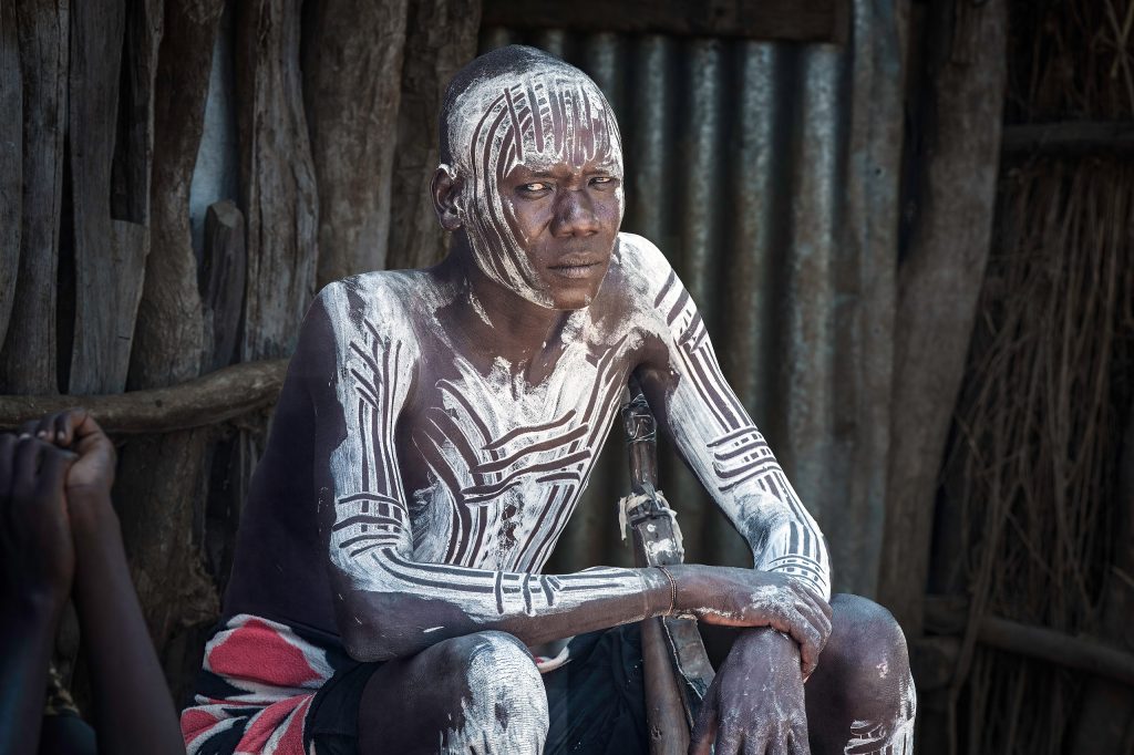young karo warrior