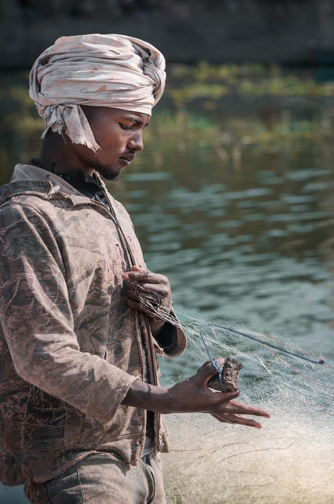 young man with fishing nets